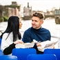 Couple sitting on Cruise with Fish and Chips